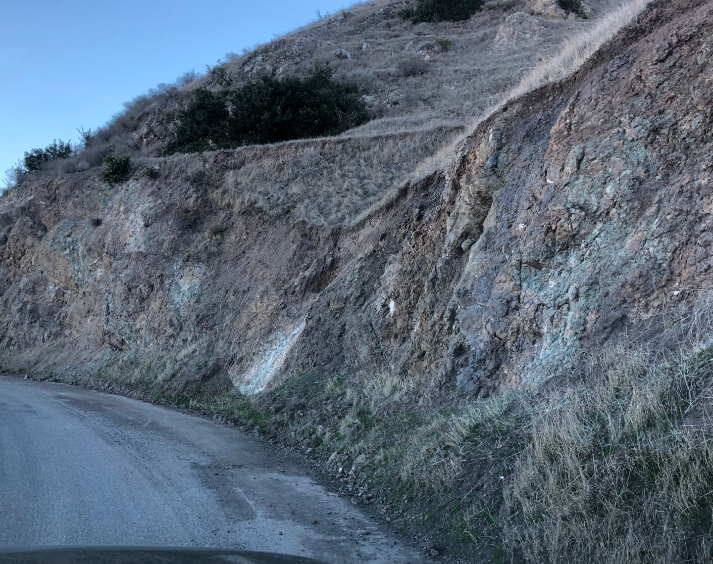 The volcanic unit, its common to see a wide range of colors like greens and purples in volcanic rocks.